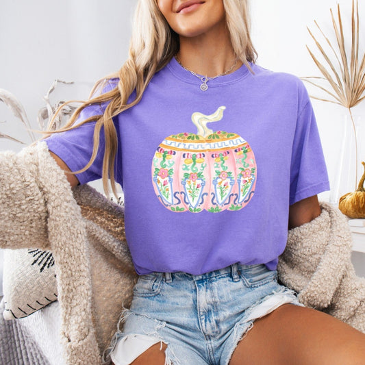 Lavender t-shirt with a colorful chinoiserie pumpkin graphic, styled with denim shorts and a cozy cardigan.