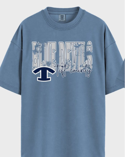 Blue Comfort Colors T-shirt with distressed white “Blue Devils” lettering and Tift County logo on the front.